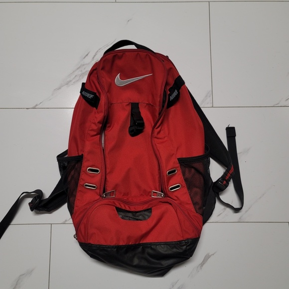 Red Nike athletic backpack